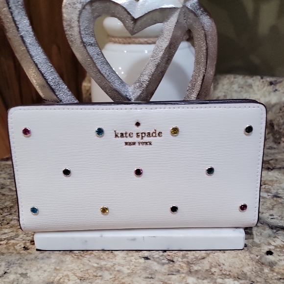 kate spade Handbags - Kate Spade EUC Madison Large Slim Bifold Wallet (Meringue)